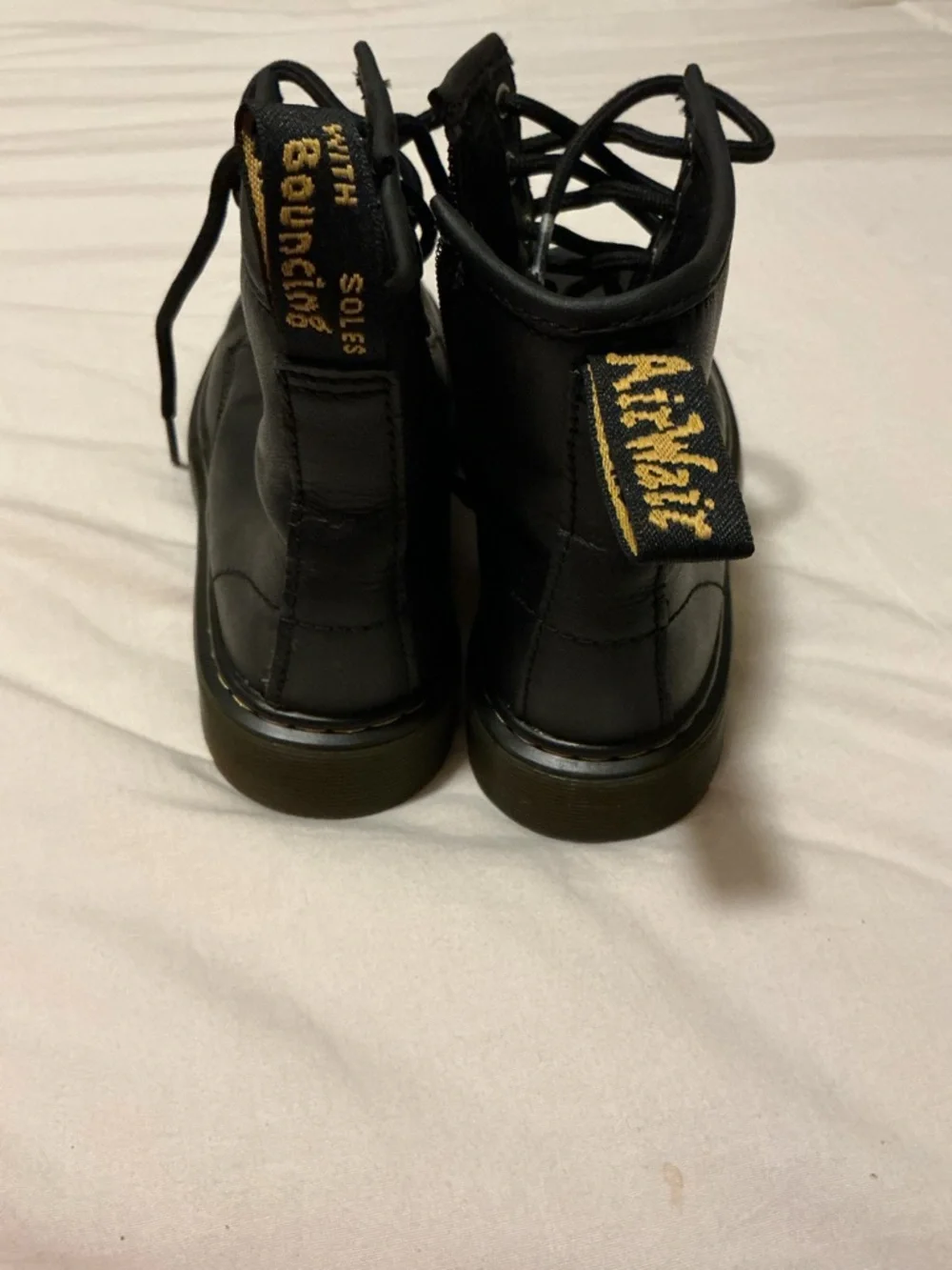 Dr. Martens Kids Black Leather Lace-Up Boots with Yellow Stitching